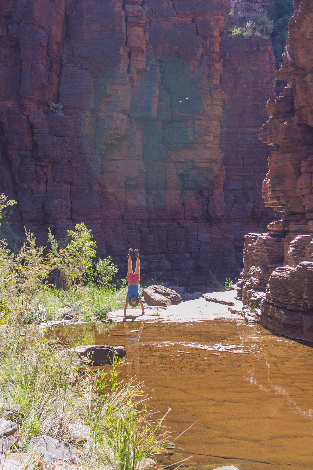 mike handstanding in a gorge